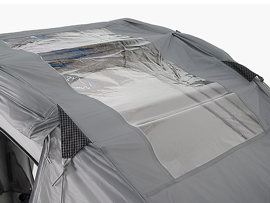 Close-up of the clear TPU roof window on the grey rainfly with its roll-up cover and zip (tent sold separately).
