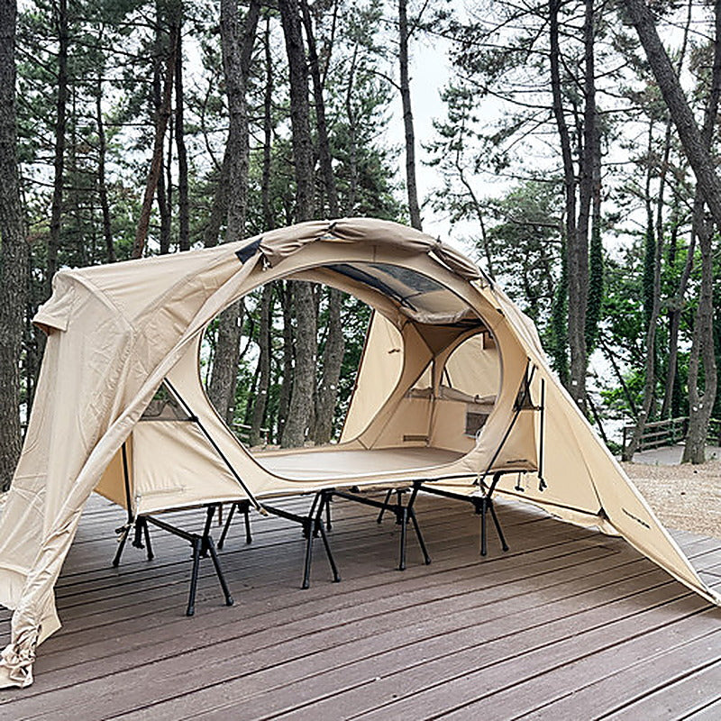 Rainfly on a forest deck with the door panel propped open as a canopy (tent, cot and door poles sold separately).