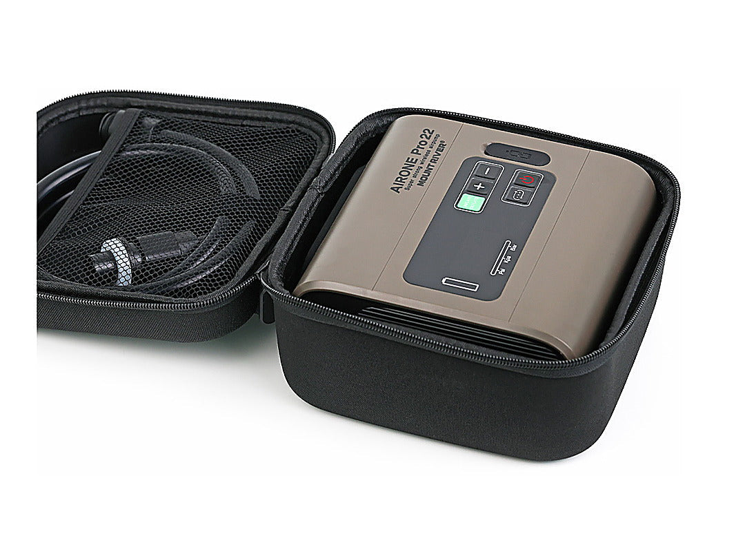 The Air One Pro 22 pump and its air hose packed inside the open EVA hard case.