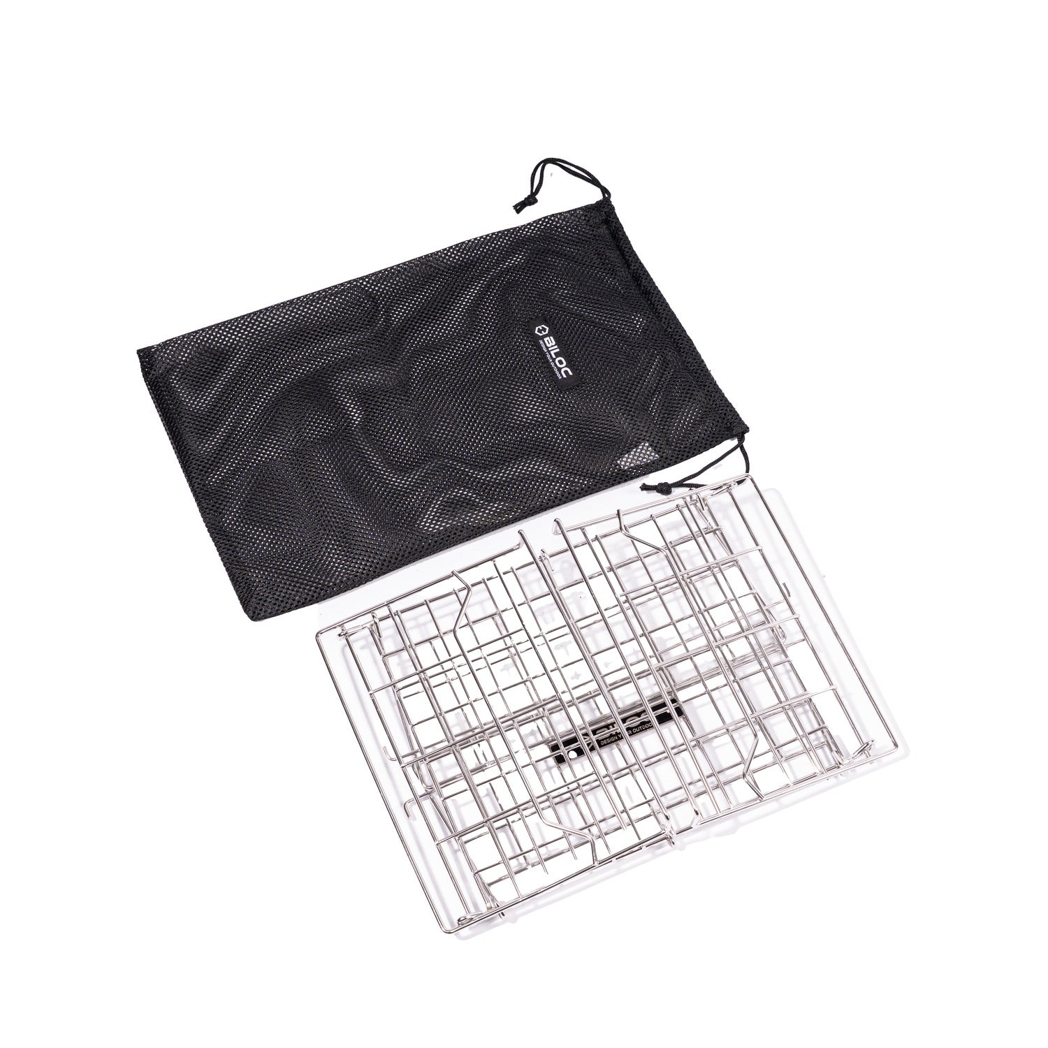 Folded basket lying flat beside its mesh carry bag, showing how little space the pair takes.