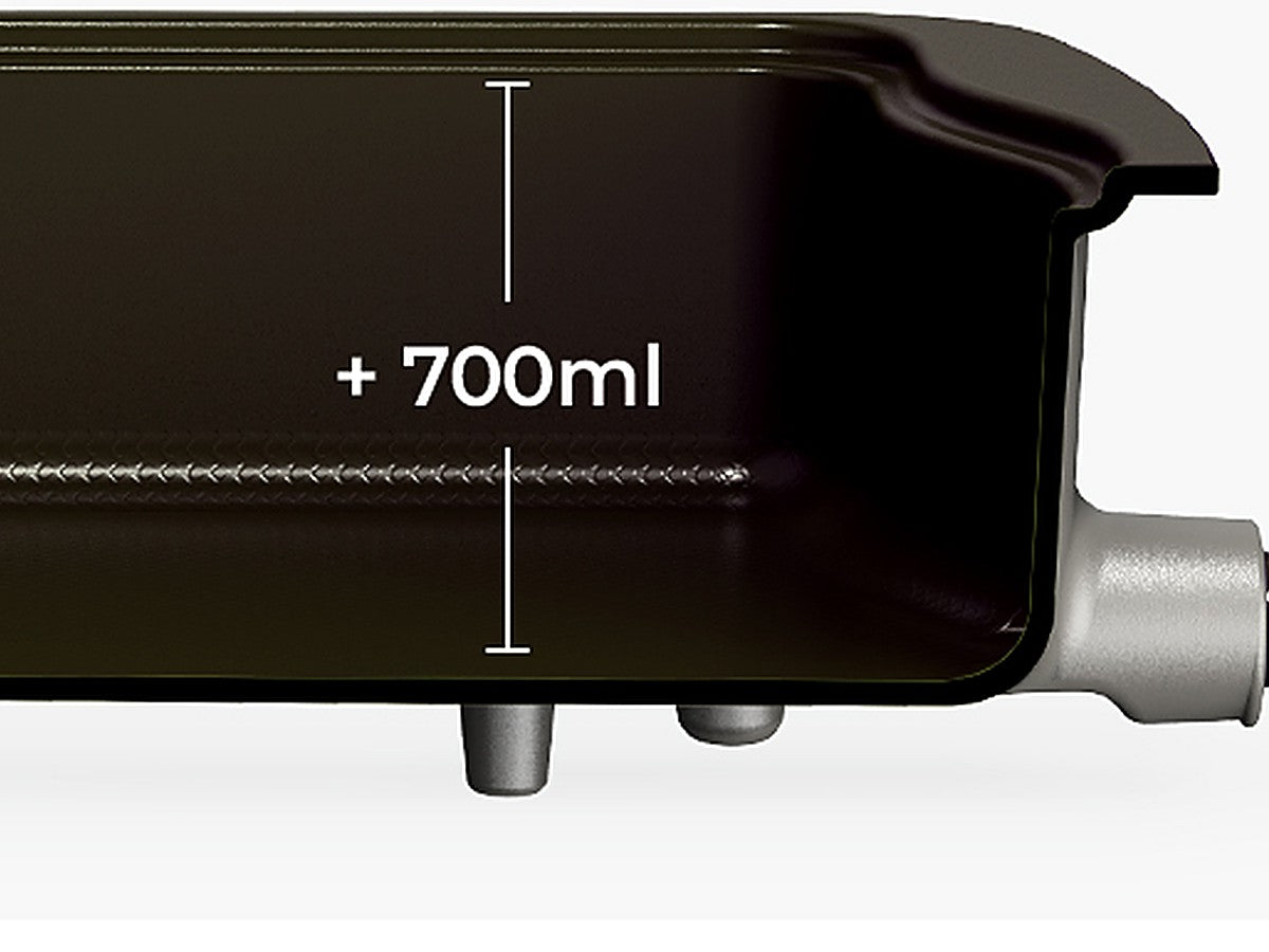 Deep ceramic-coated hot-pot pan on the stove