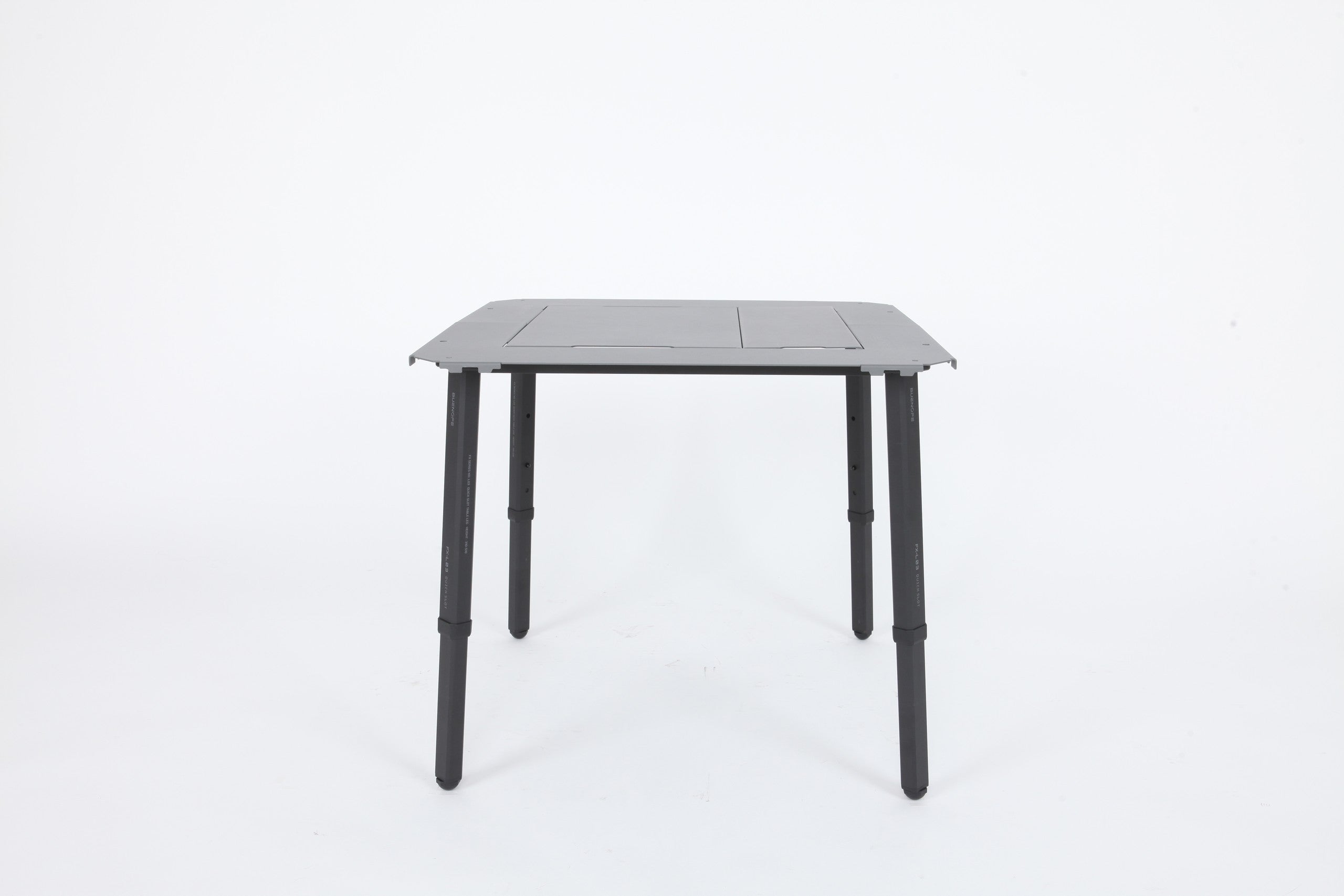 BUENOFE IGT Connect Table 1.5 standalone table with quick-slot legs extended to the raised height stage on a white studio background, showing how the surface height adjusts.