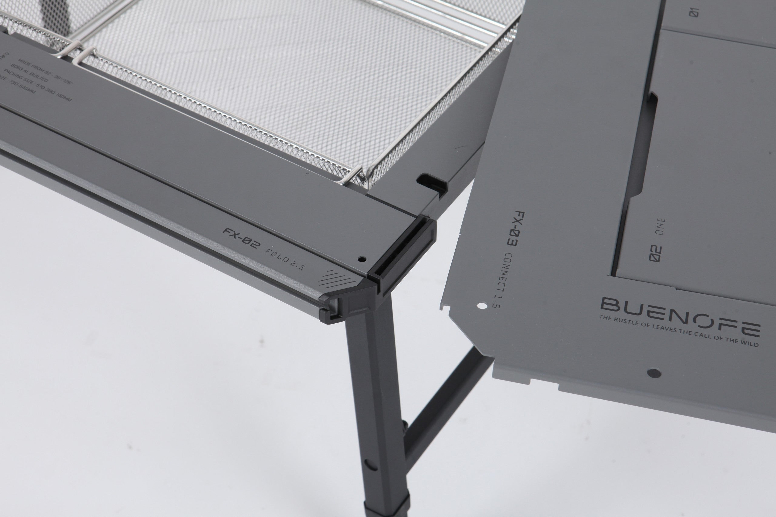 Close-up of the BUENOFE IGT Connect Table 1.5 connection point where its rail links to a BUENOFE FX-02 folding table, detailing the interlocking edge that joins two tables into one surface.