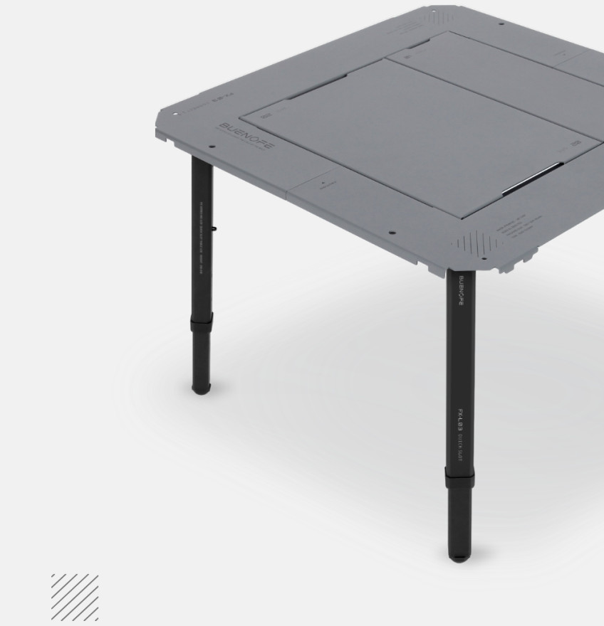 BUENOFE IGT Quick Slot Table Leg photographed from a low studio angle on a soft gray background, emphasizing the four black adjustable legs beneath a gray IGT tabletop for a sturdy standalone setup.
