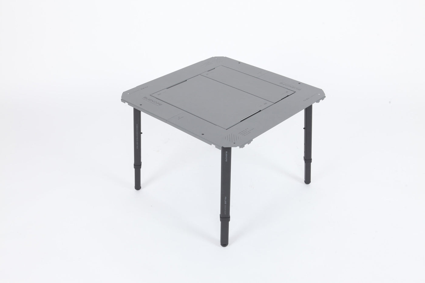 BUENOFE IGT Quick Slot Table Leg shown supporting an assembled gray IGT 1.5 table in a clean three-quarter studio view on a white background, the four black legs giving the frame a freestanding table height.