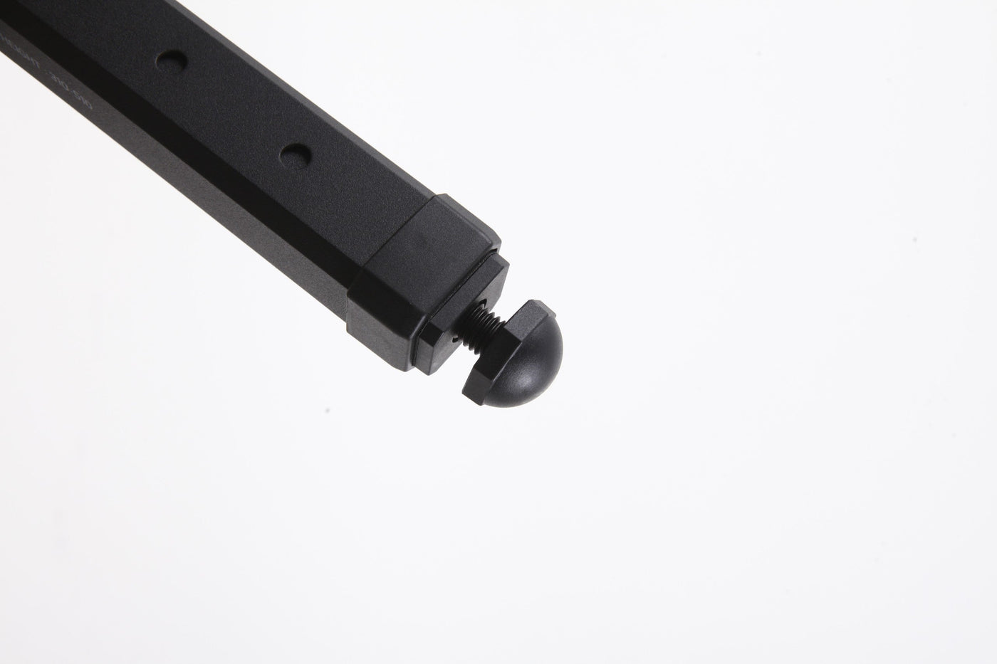 BUENOFE IGT Quick Slot Table Leg shown in a white-background close-up of the leveling foot, the domed non-slip foot threaded on a micro-adjustment screw that turns to fine-tune each leg on uneven ground.