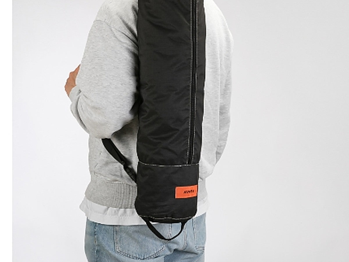 Carry case with shoulder strap worn over the shoulder