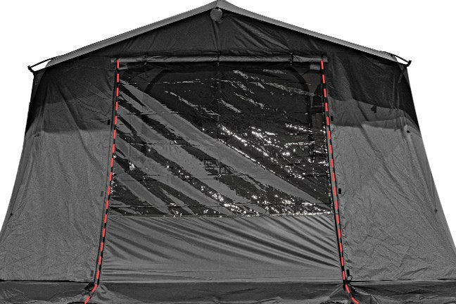 Hand zipping the TPU panel zipper into the Albion tent front zipper from below upward
