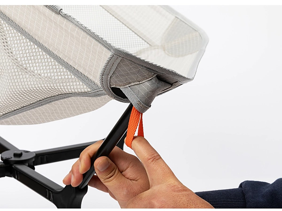 Orange point-webbing loop being pulled onto a frame tip