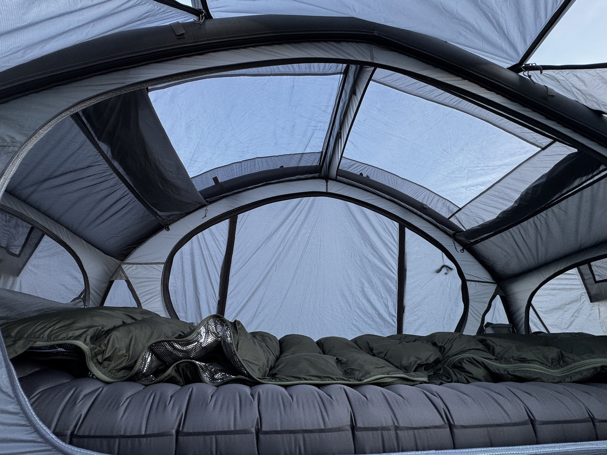 Inside the Neo Nest 80 Air: air-beam arch and mesh ceiling, rainfly overhead (rainfly, cot and bedding sold separately).