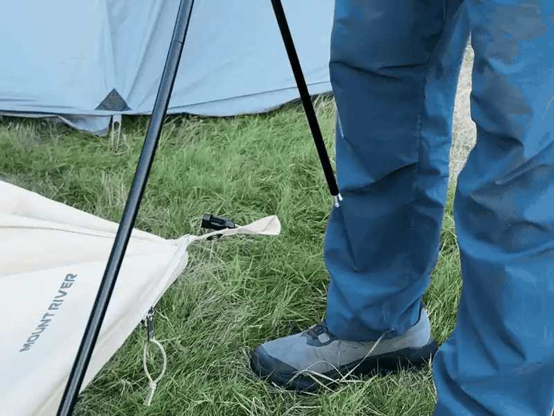 Set-up loop: seating a pole end onto the corner pin of the Neo Nest 80.