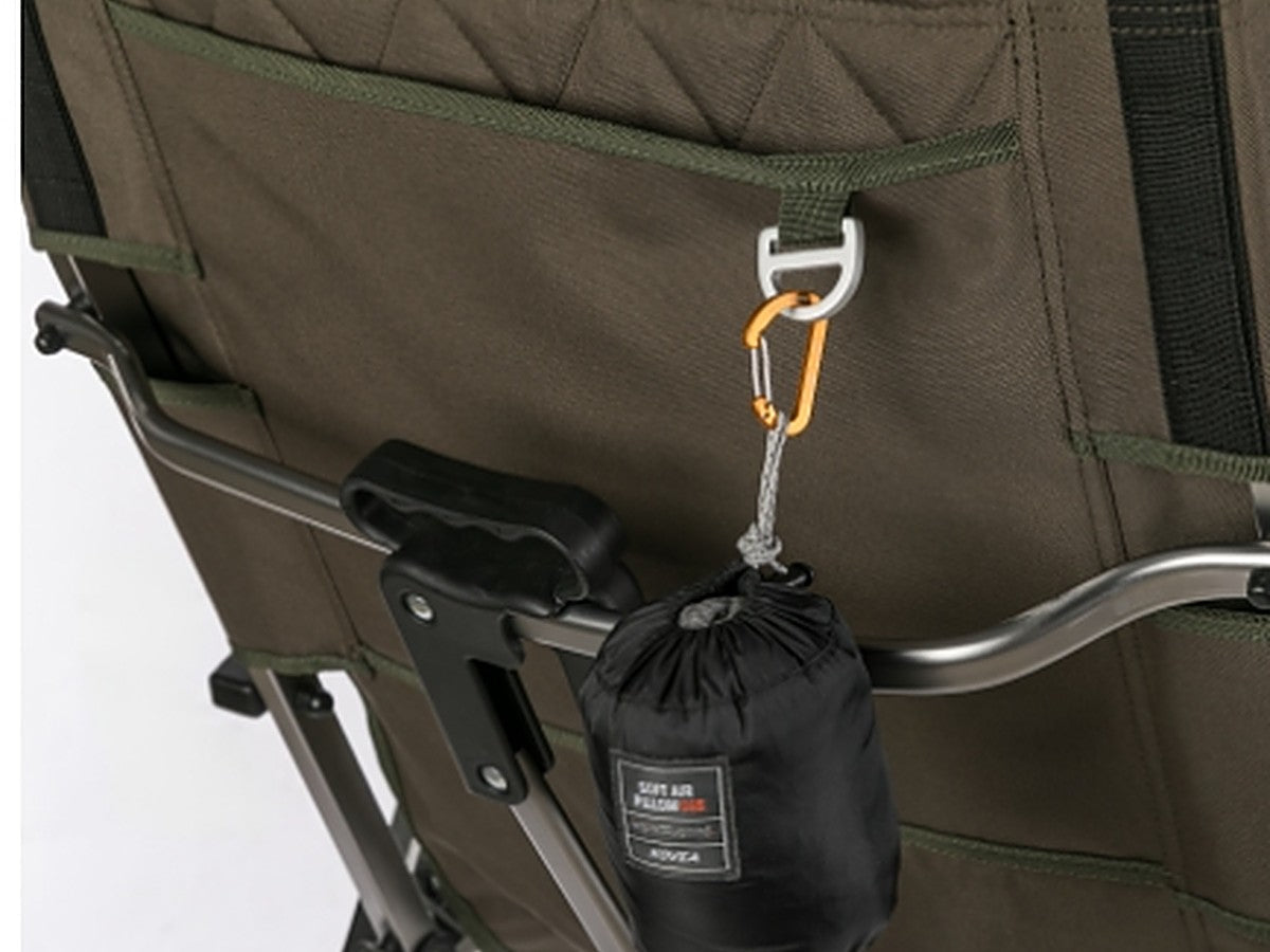 Carabiner and stuff sack clipped to the backrest D-ring