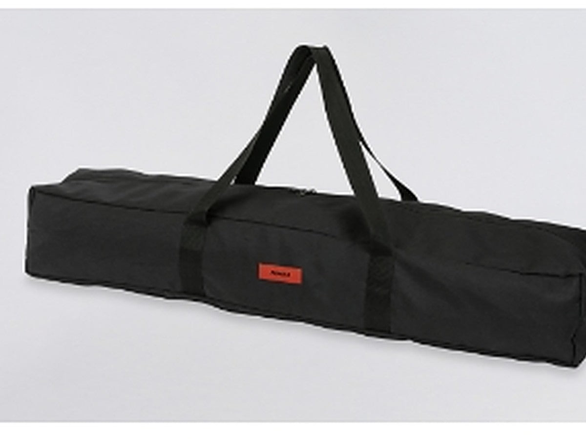 Recliner chair folded and stowed in its carry bag