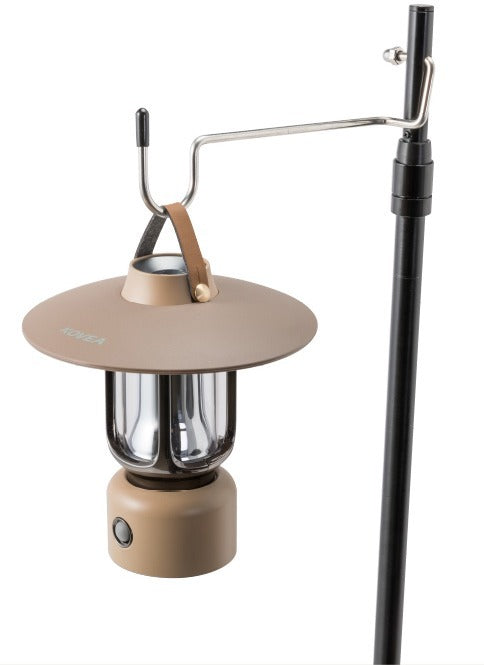Rico Lantern hanging from a metal lantern hook attached to a pole