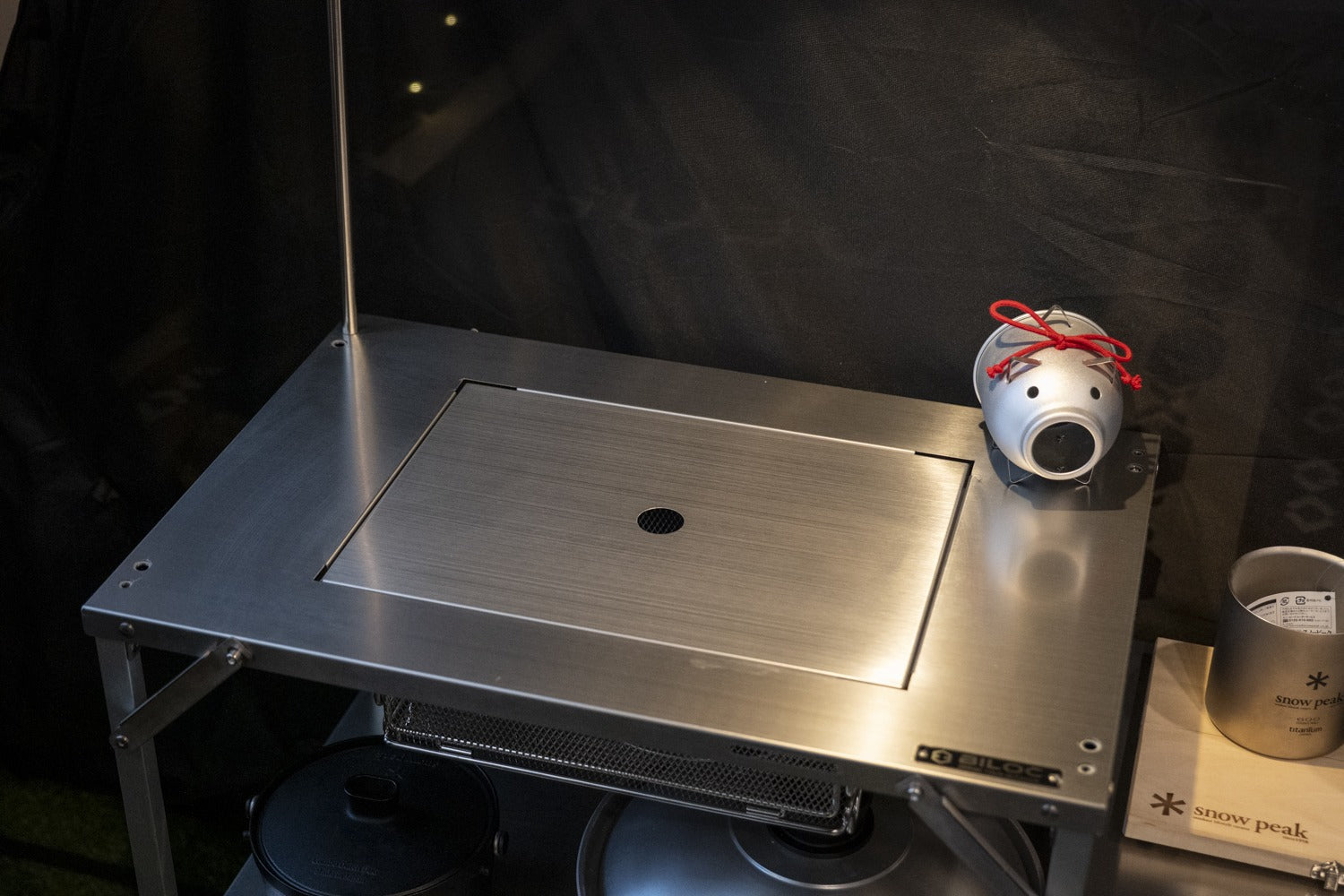The Stella shelf top with the plate closed flush over the IGT bay. The styling props shown are not included.