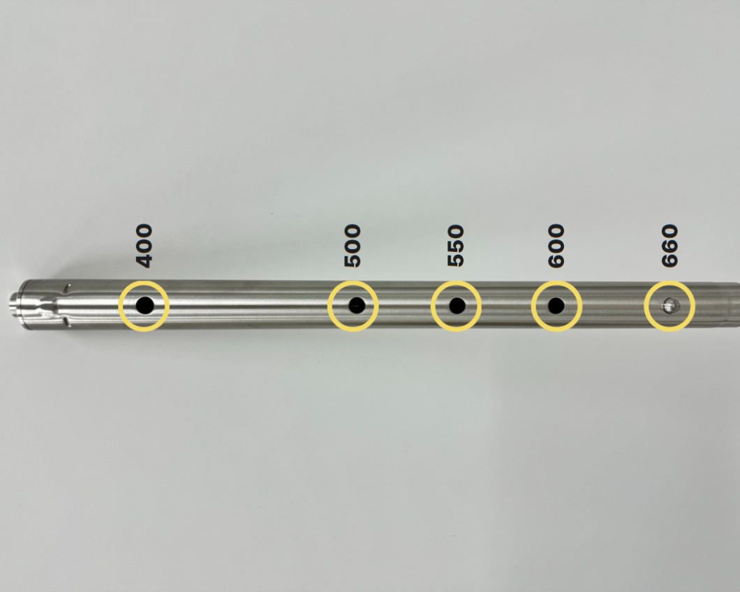 Leg shaft showing five labeled height holes from 400 to 660 mm